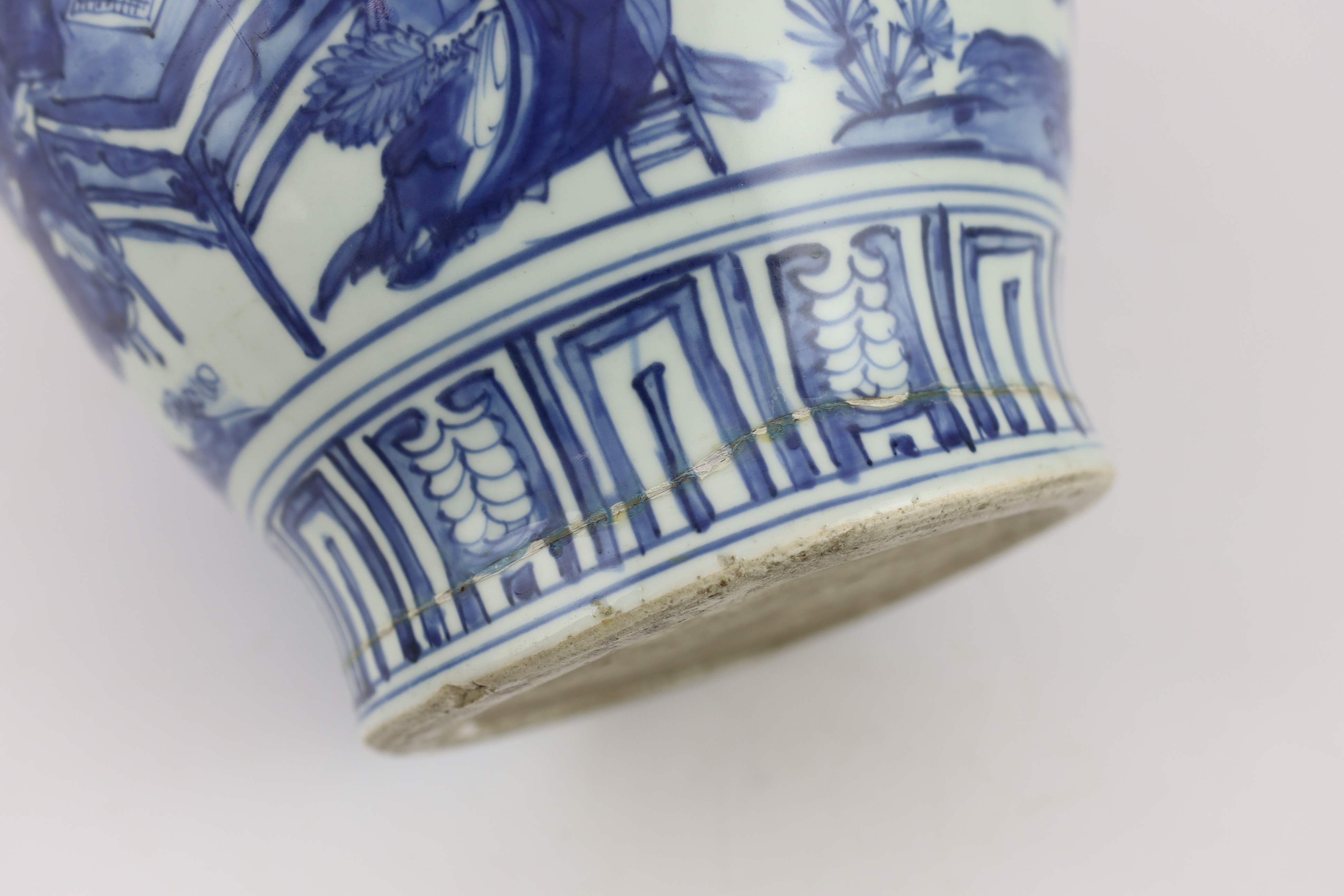 A Chinese Ming blue and white ‘scholars’ jar, guan, Wanli period (1572-1620), broken around base and restuck